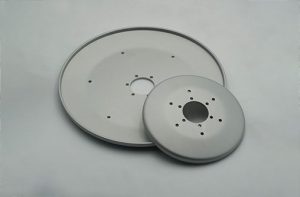 Turned metal plates with central hub
