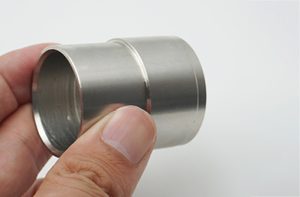 Stainless steel fitting with internal threads